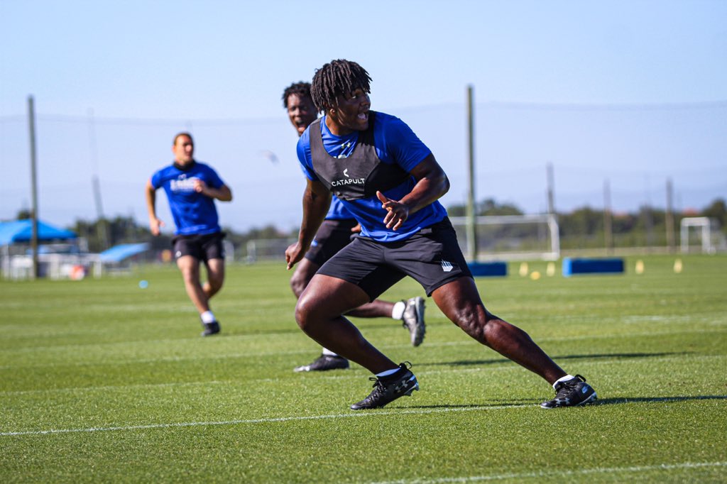 malik bryant practicing on field