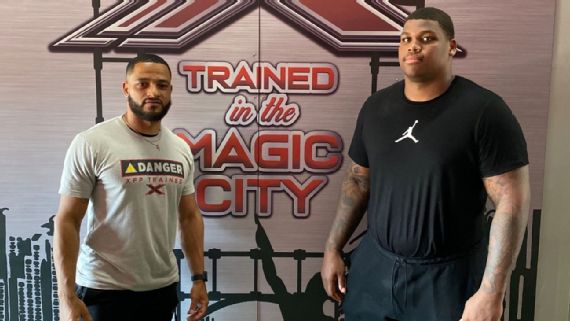 Jets Quinnen Williams with personal trainer Kevin Brown